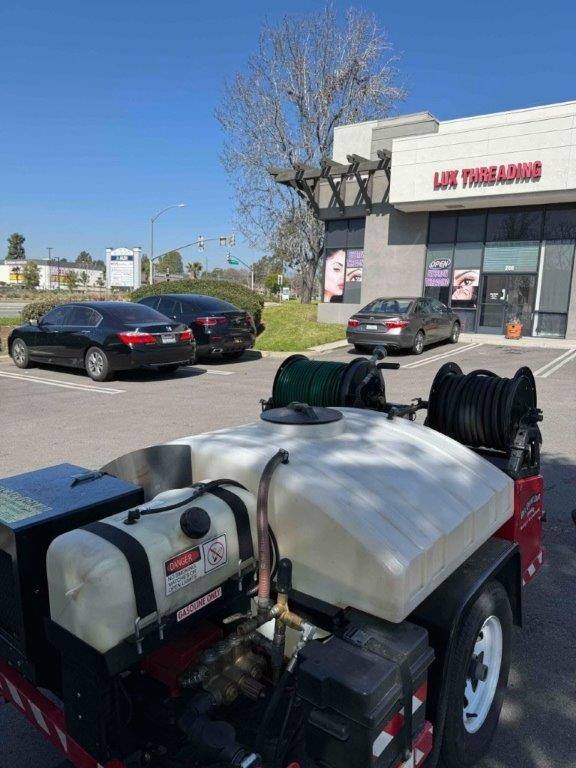 Hydrojetting service clearing a blocked sewer line